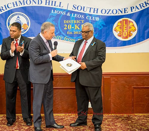 Todd D. Greenberg Esq, presenting New York State Senate Citation to members of the Richmond Hill-S Ozone Park Lions Club